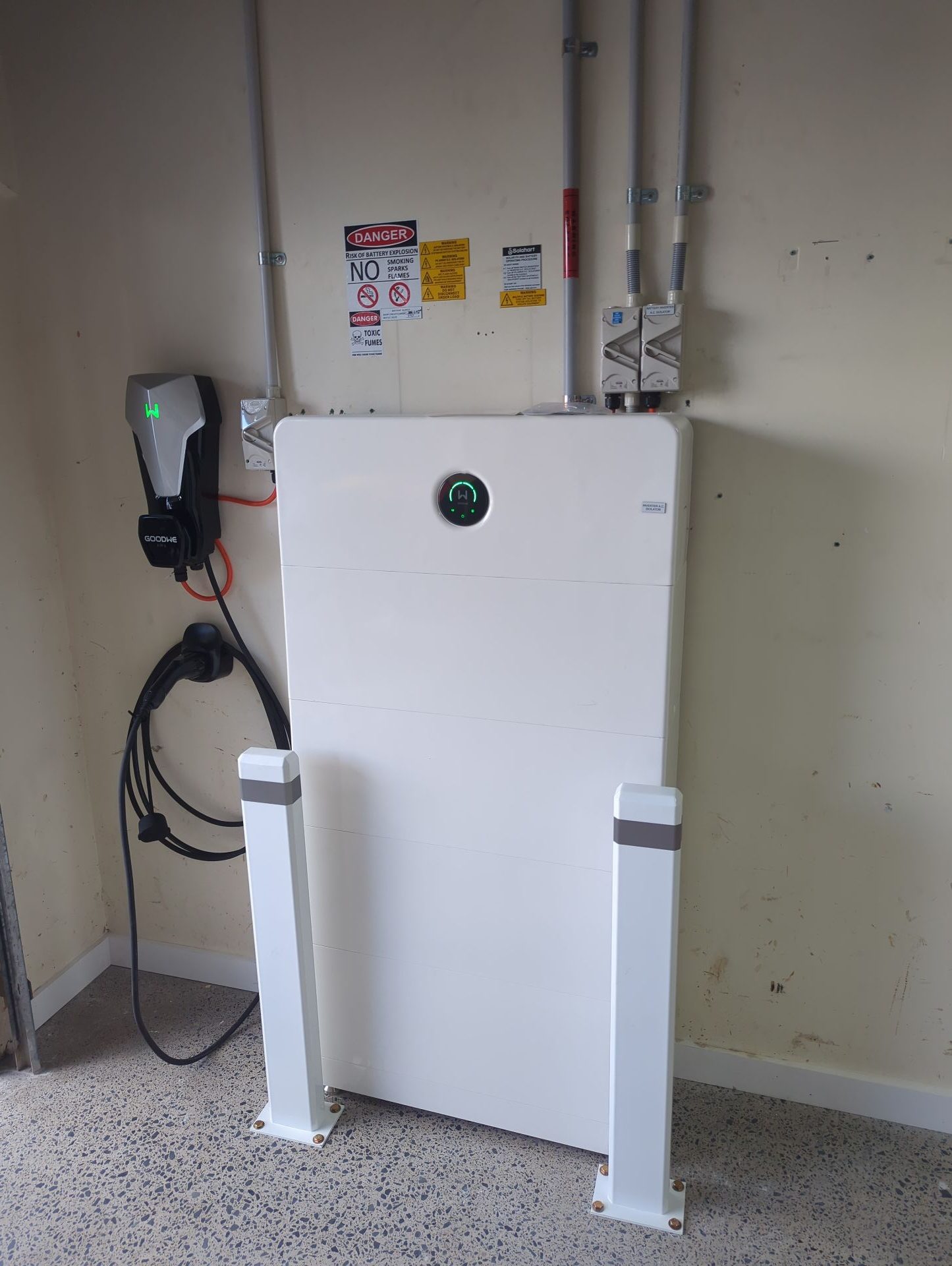 Home EV charger mounted on an exterior wall